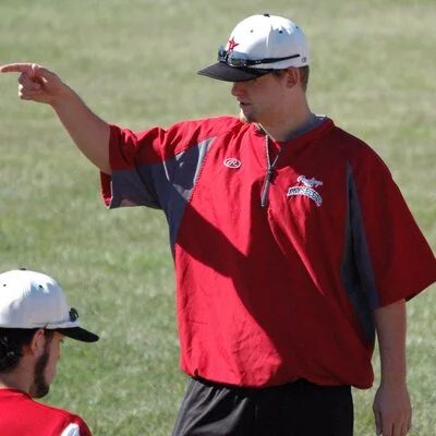 Eric Ruehl coaching on the field