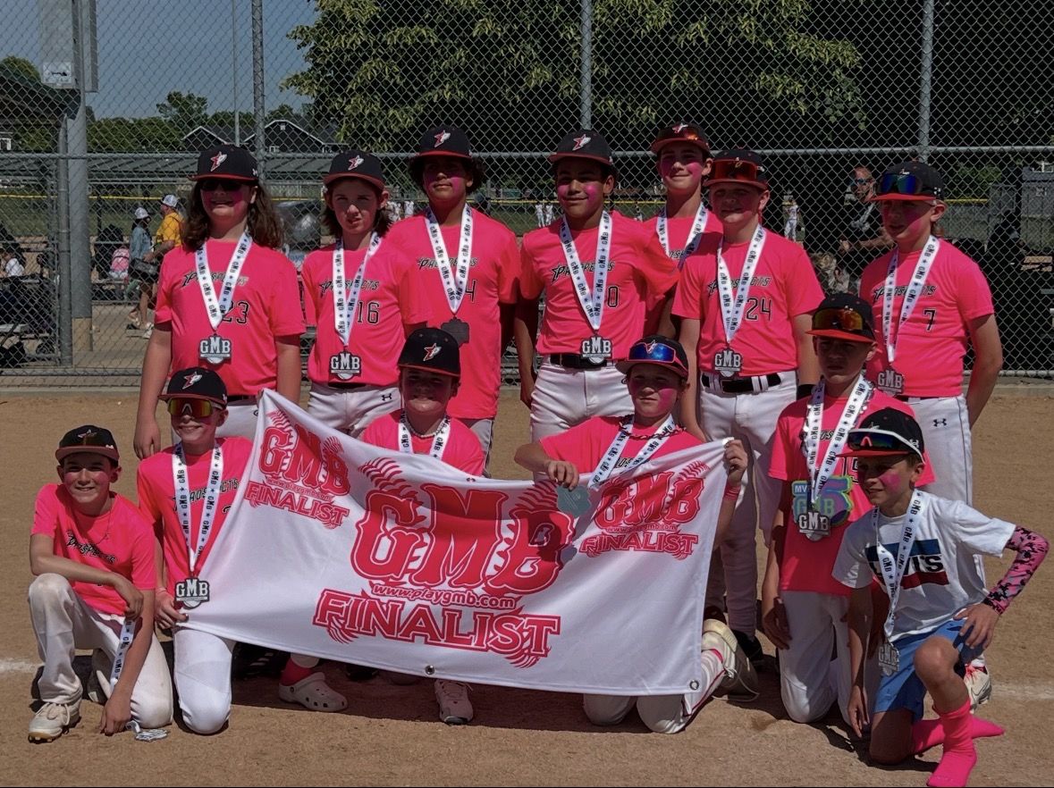 Southside Prospects team in pink jerseys with a GMB finalist banner